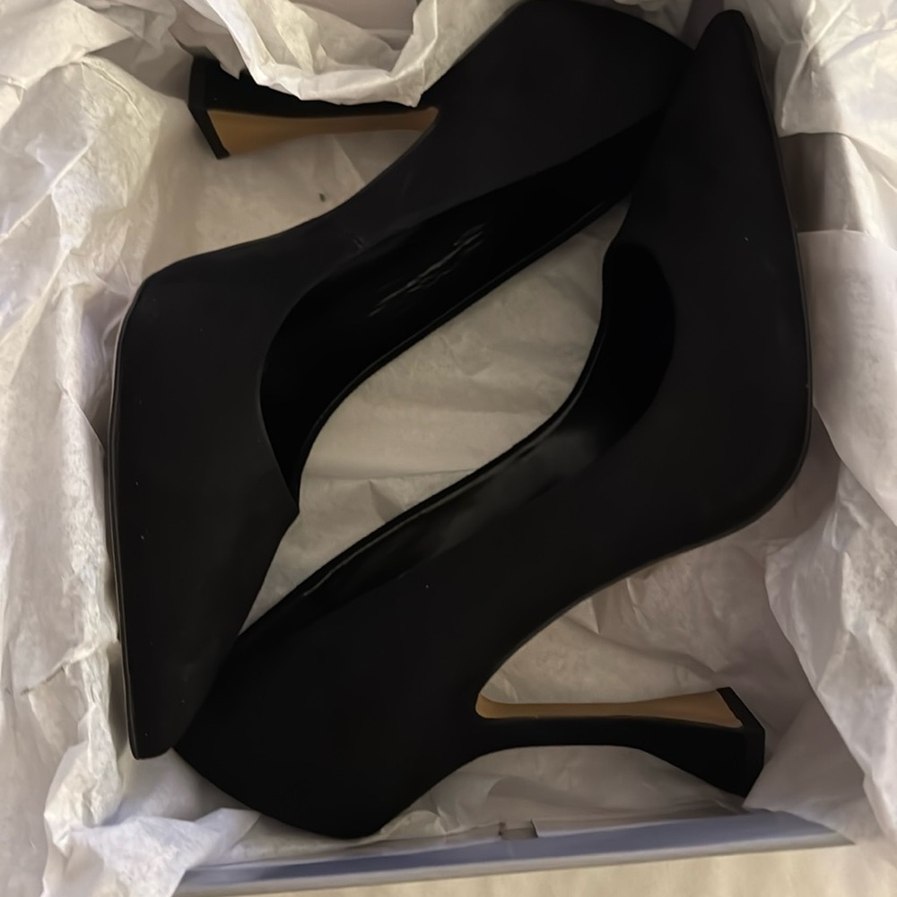 JLO high heels black shoes never worn.